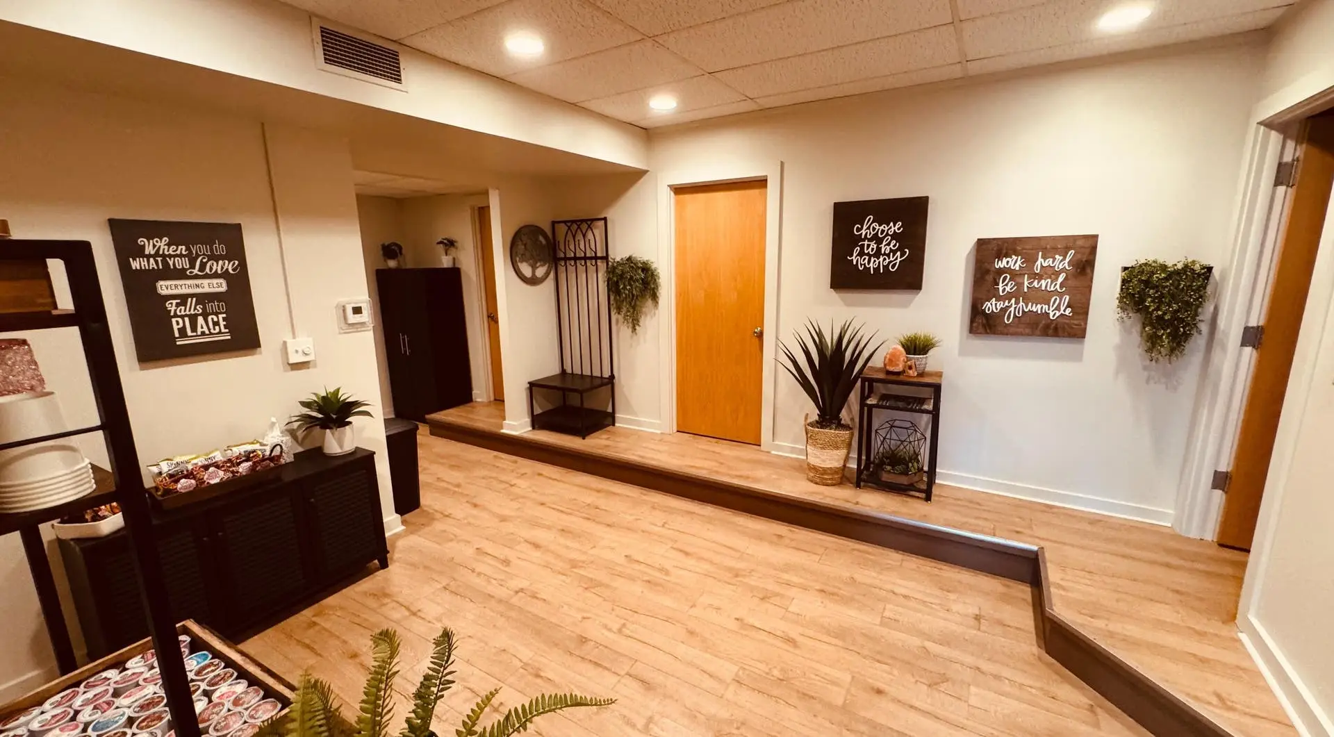 Welcoming lobby and hallway at Well Being massage studio in Akron, Ohio