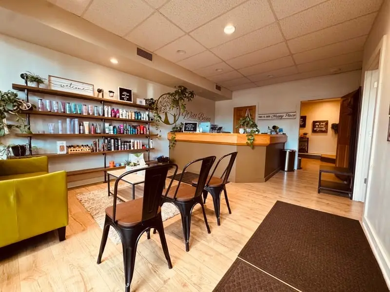 Reception and waiting area at Well Being massage studio in Akron, Ohio